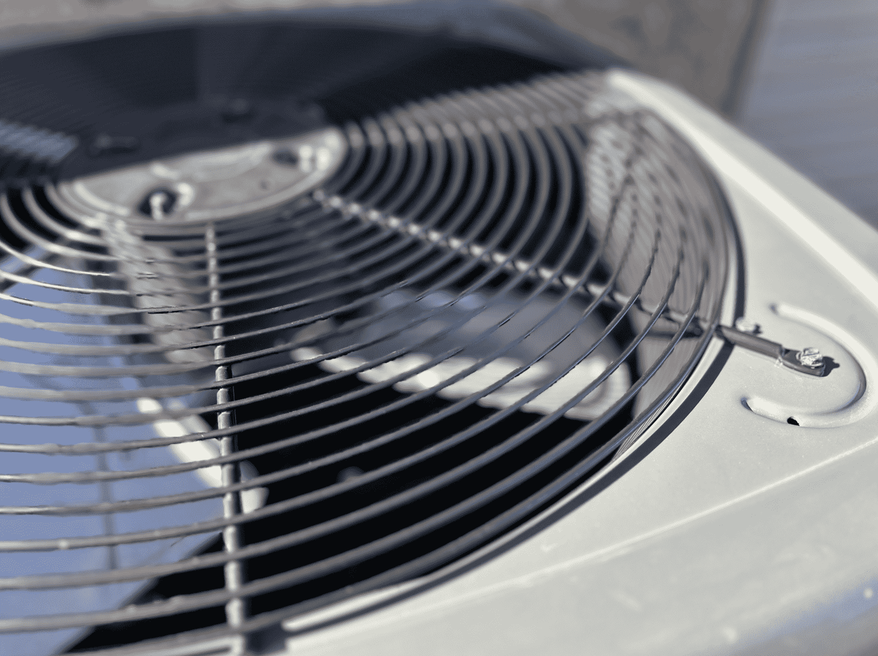 Close-up view of an air conditioner condenser fan used on the Honest Fix AC pricing page, photographed in Steubenville, Ohio.