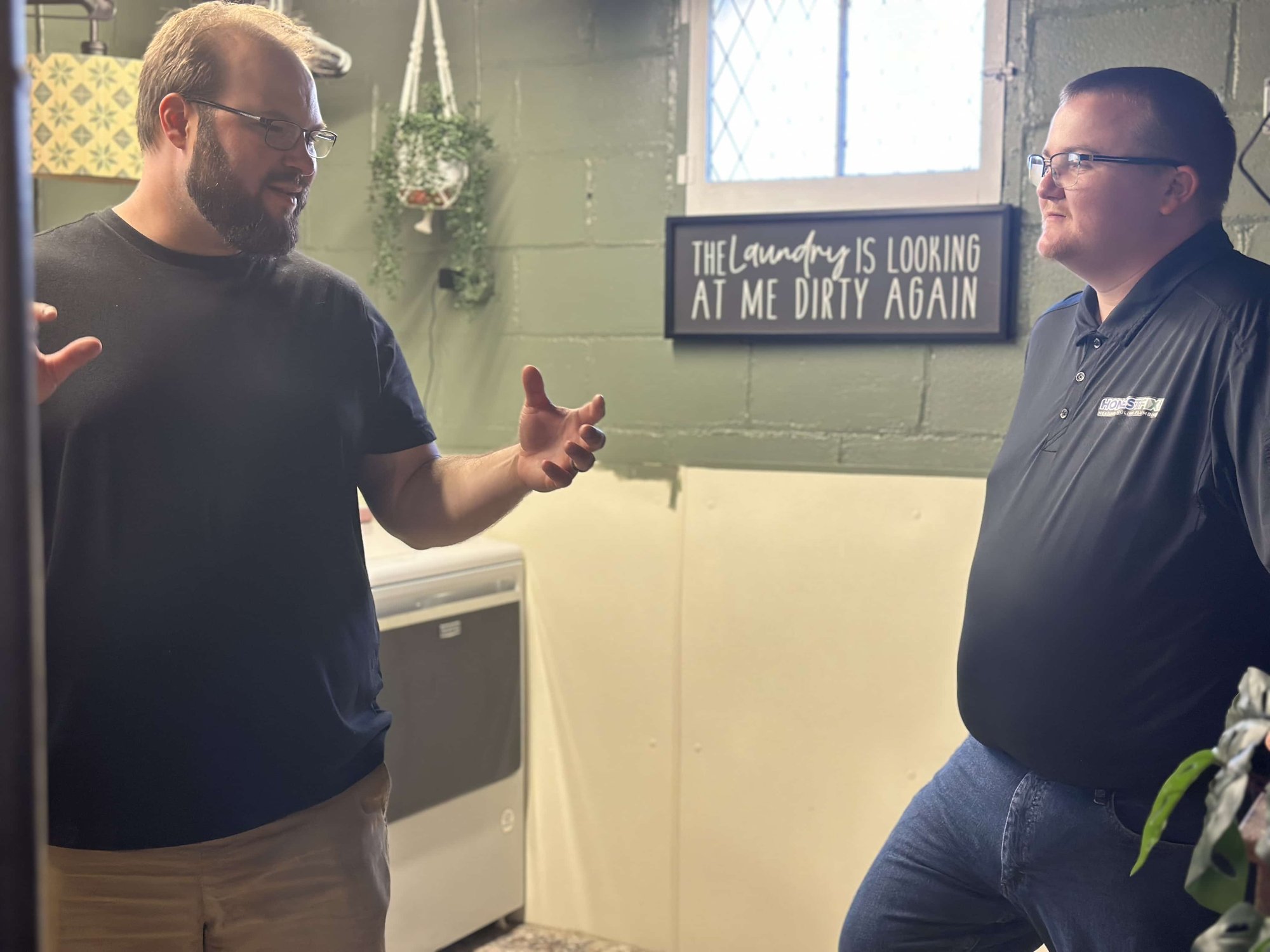 honest-fix-owner-alex-largent-discussing-hvac-options-with-homeowner-steubenville-oh