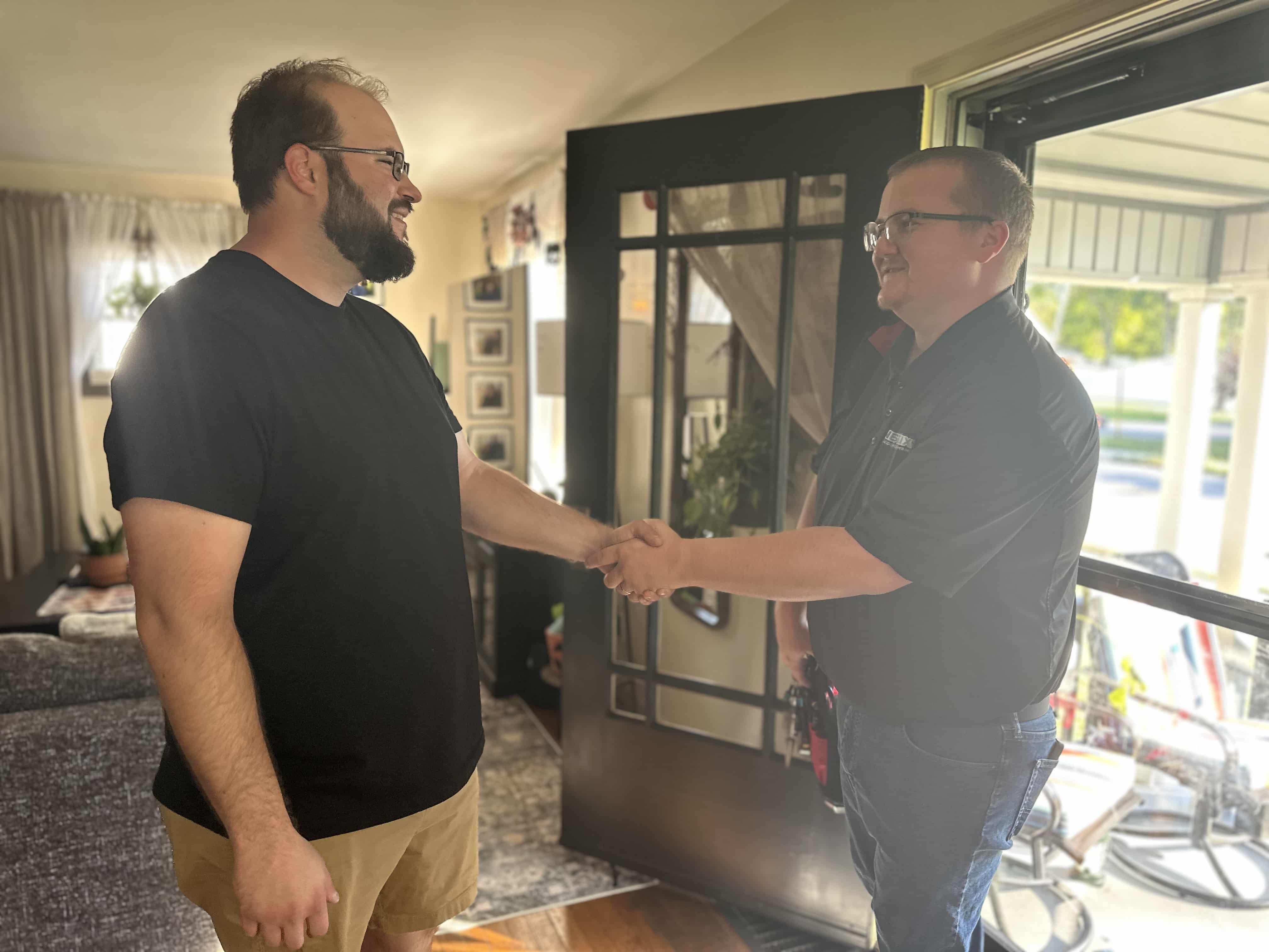 honest-fix-owner-alex-largent-greeting-homeowner-steubenville-oh