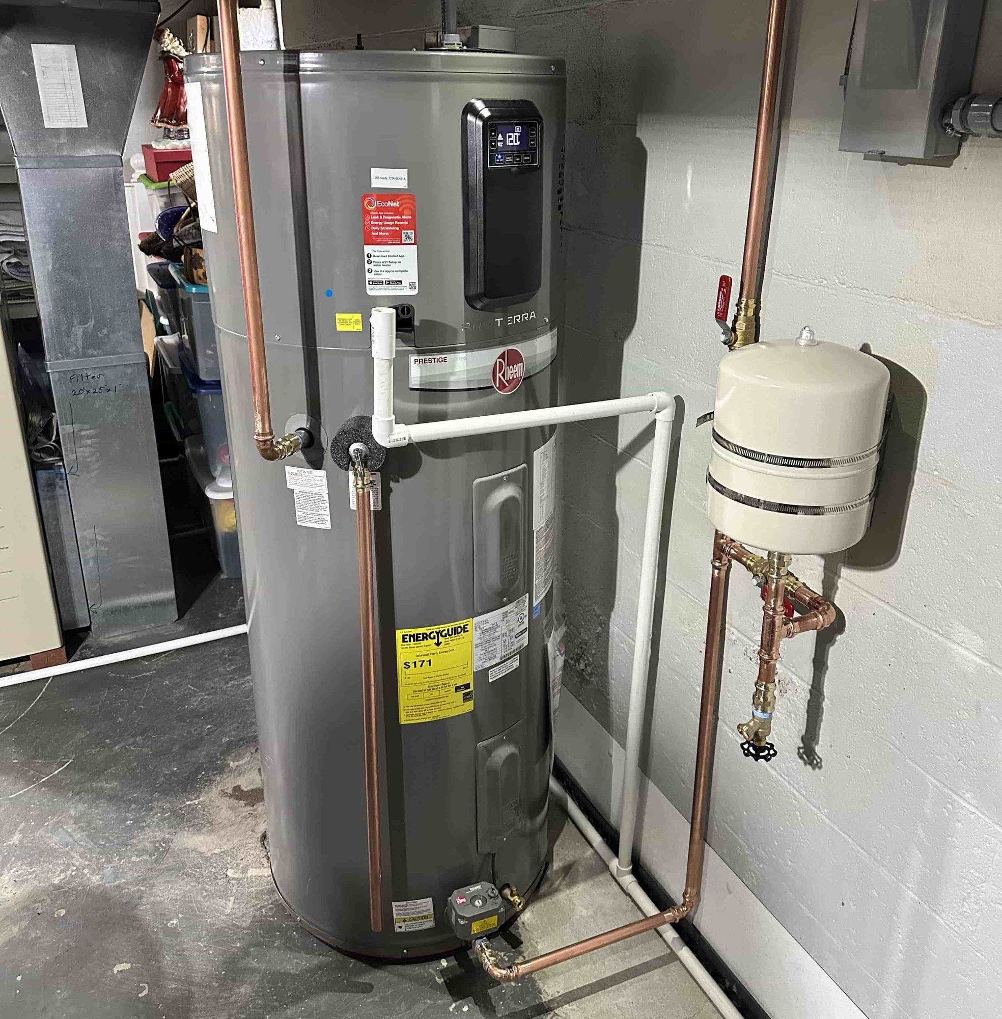 Rheem electric water heater installed by Honest Fix in a Steubenville, Ohio home, showing clean copper piping and a properly mounted expansion tank water heater Services