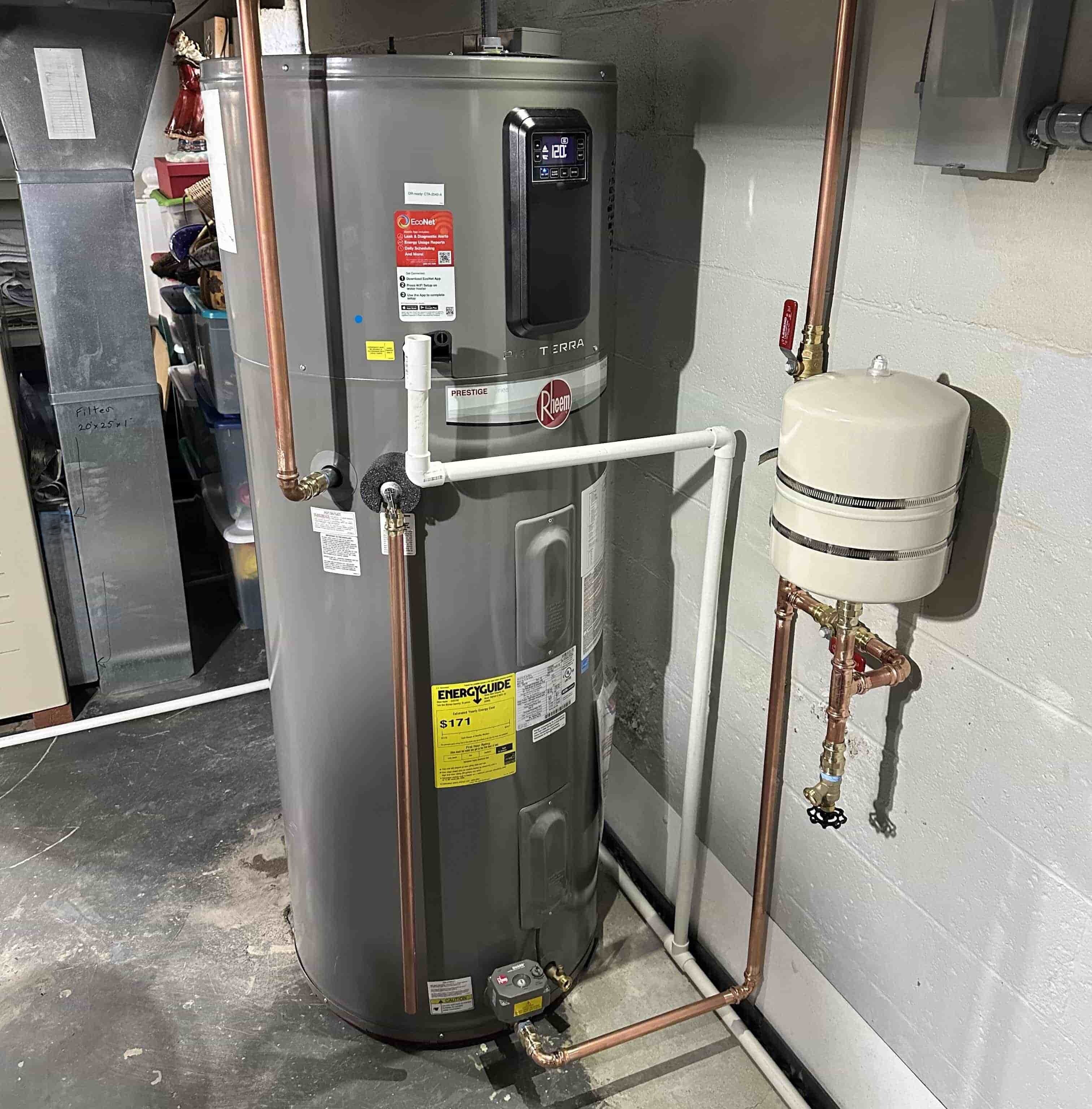 Rheem electric water heater installed by Honest Fix in a Steubenville, Ohio home, showing clean copper piping and a properly mounted expansion tank water heater Services