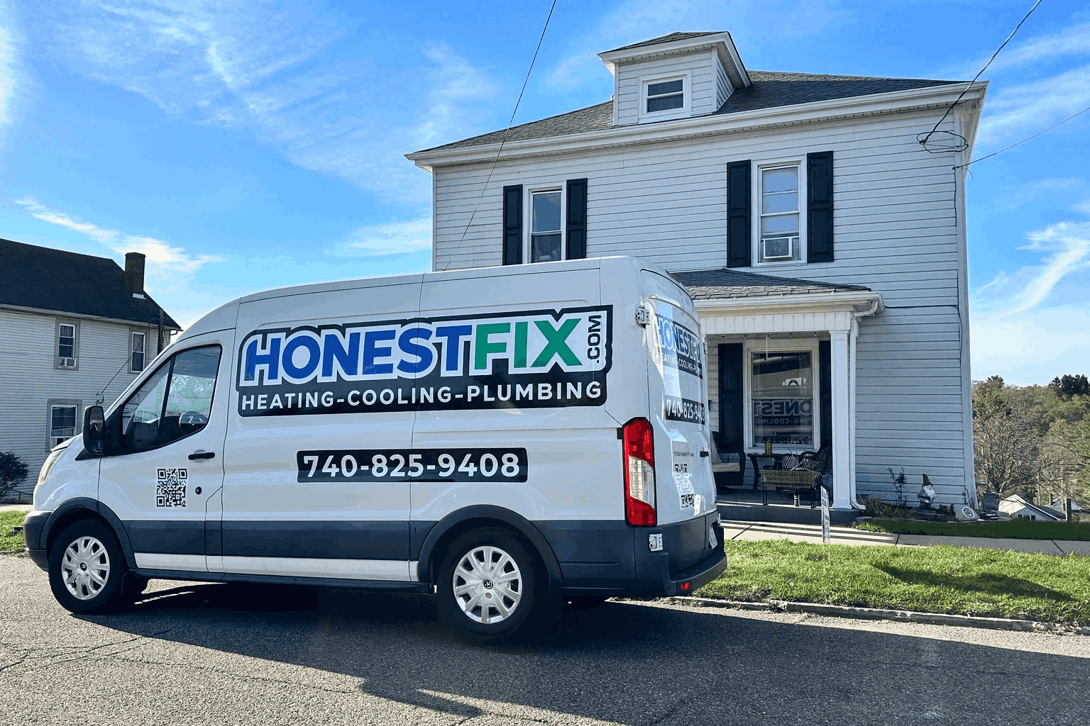 Honest Fix Heating, Cooling & Plumbing service van parked outside a home in Steubenville, OH, representing trusted local HVAC and plumbing service.